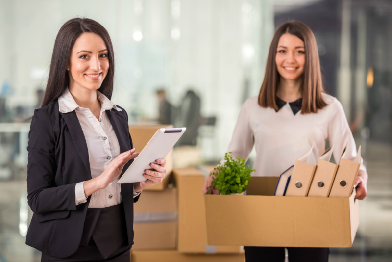 Businesswomen with Moving Boxes | 3GuysMoving.com